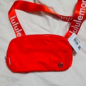 Lulu Everywhere Belt Bag world mark solar orange